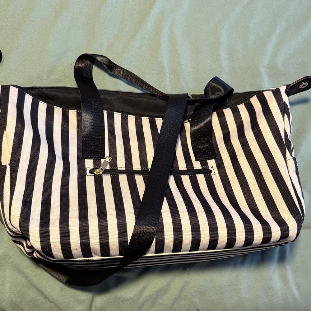 Alice + Olivia striped travel bag with Gold Accent